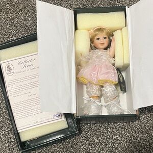 Geppeddo Collector Series Porcelain Doll- Aubree, with Pink Dress